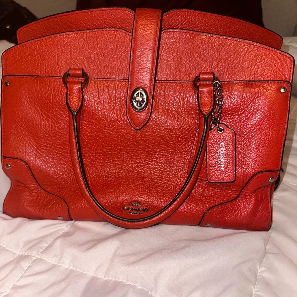 I’m selling a coach purse that is very well taken care of.